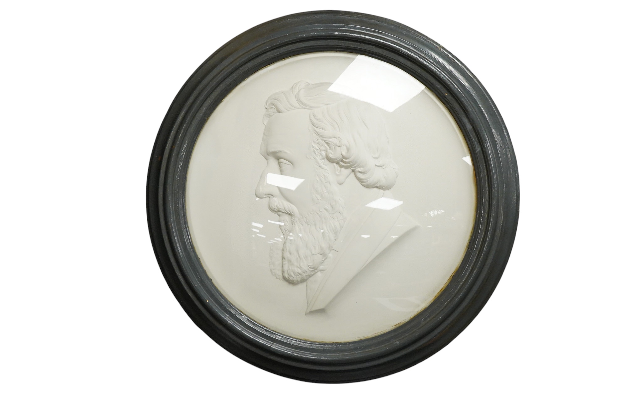 A large Victorian circular plaster portrait relief of a bearded gentleman, framed, 62cm in diameter
